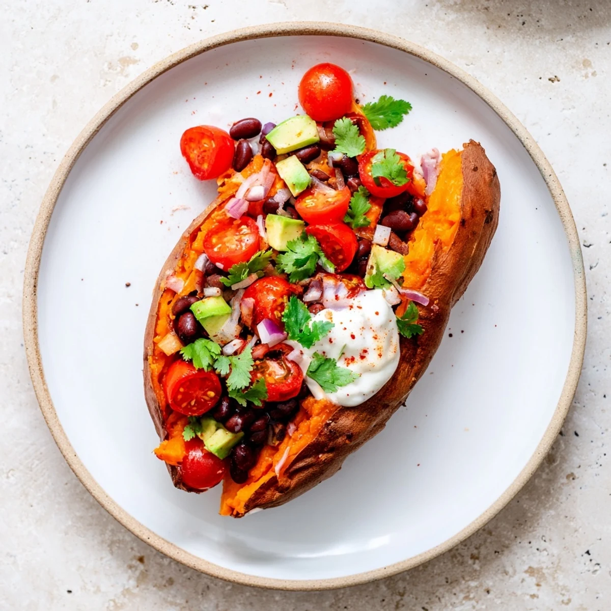 Golden, steaming Loaded Baked Sweet Potatoes, brimming with flavorful black beans and fresh toppings.