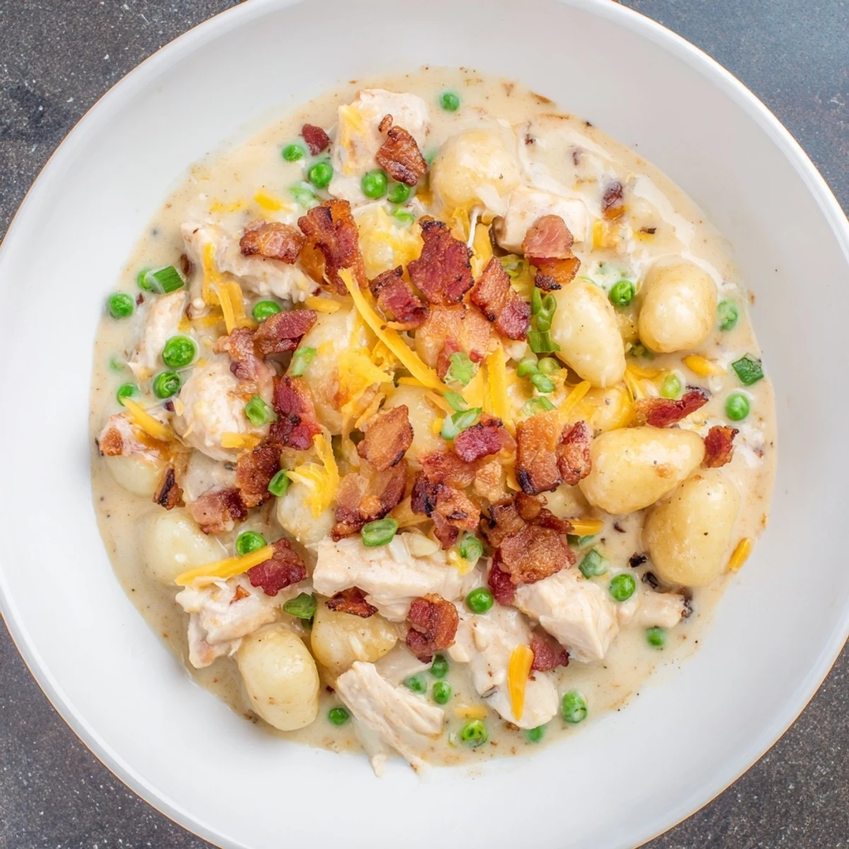 A visually delicious view of creamy crack chicken gnocchi, a one-pot meal with savory aroma.