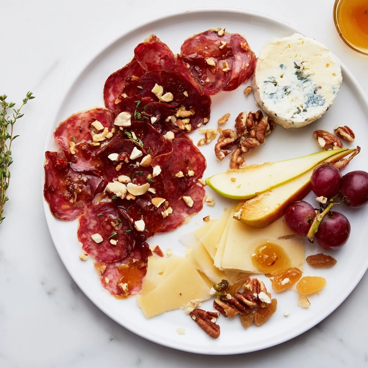 A beautifully arranged Majestic Venison Charcuterie Platter overflowing with savory cured venison and artisanal cheeses.
