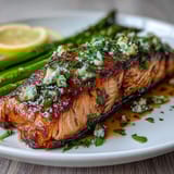 Flavorful garlic butter salmon and bright asparagus cooked together in one pan, ideal for busy weeknight meals.  