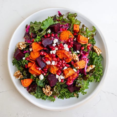 Vibrant Hot Girl Winter Salad featuring roasted root vegetables, citrus bursts, and creamy feta cheese.