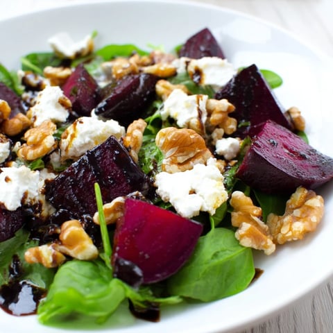 Vibrant Beet and Goat Cheese Salad, showing colorful roasted beets with creamy goat cheese.