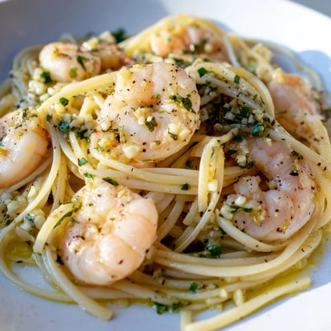 Golden-brown shrimp and lemon herb pasta, a delicious light meal for a busy weeknight.